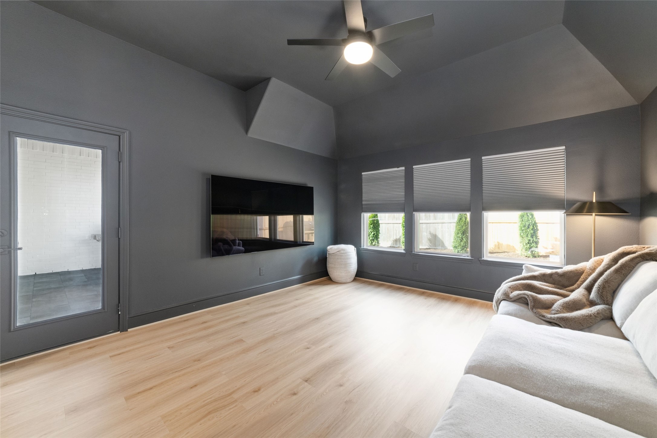 15208 Tree Swallow Court Magnolia, TX 77354 - Photo 25 of 50 a living room with furniture and a flat screen tv