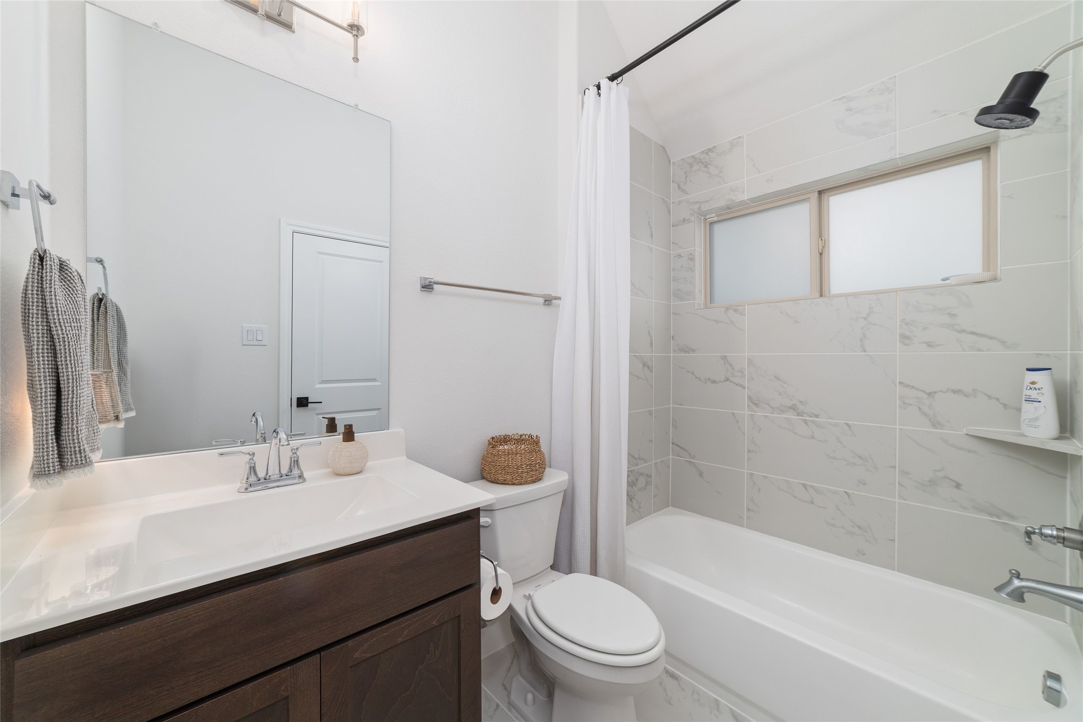 15208 Tree Swallow Court Magnolia, TX 77354 - Photo 28 of 50 a bathroom with a sink a toilet and shower