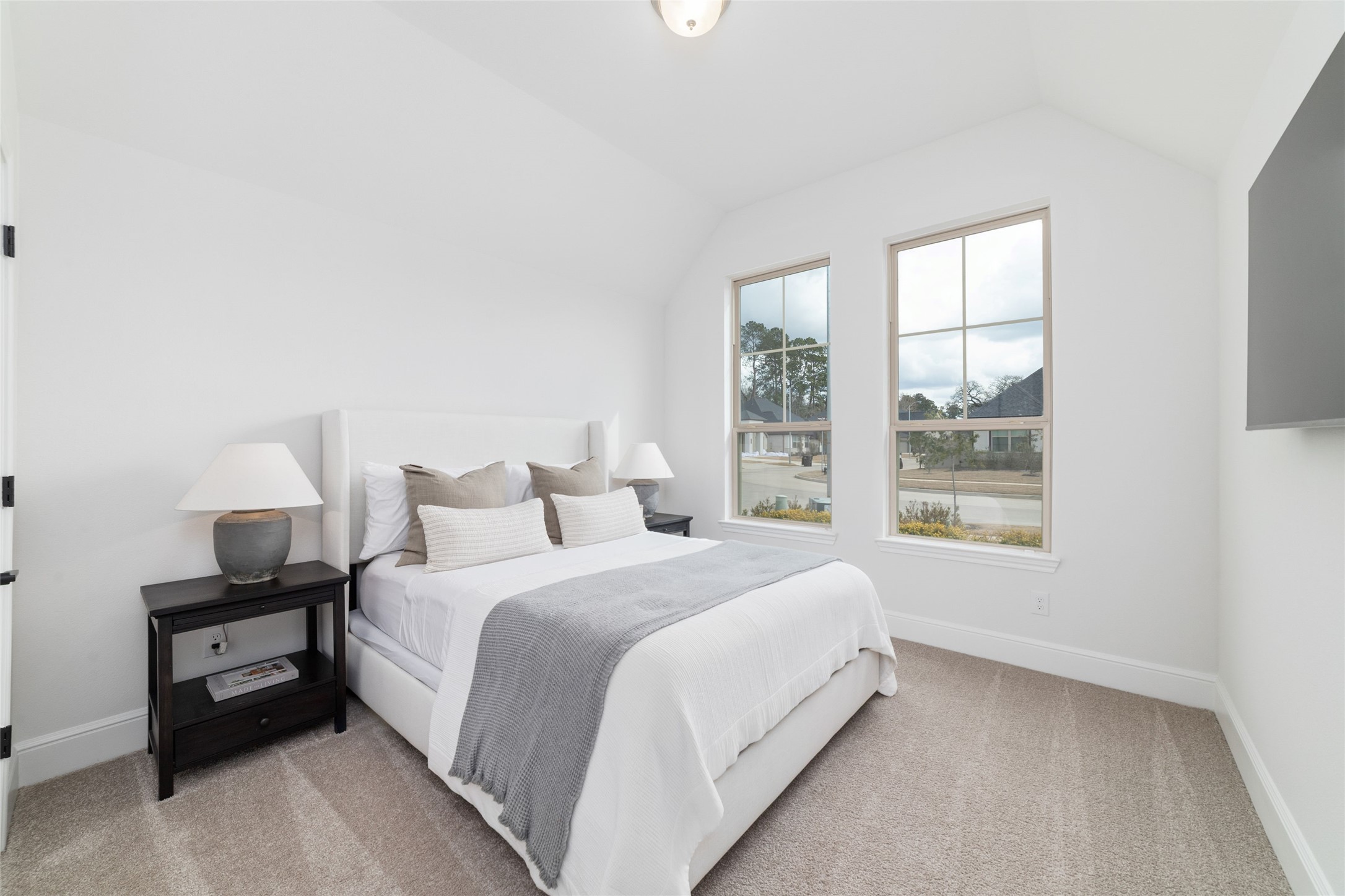 15208 Tree Swallow Court Magnolia, TX 77354 - Photo 30 of 50 a bedroom with a bed and a window