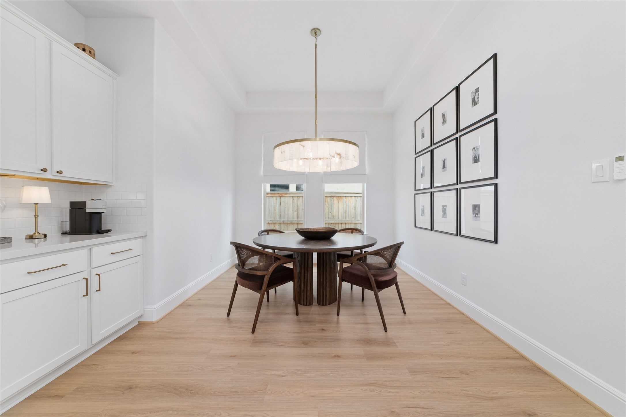 15208 Tree Swallow Court Magnolia, TX 77354 - Photo 10 of 50 a view of a dining room with furniture window and wooden floor