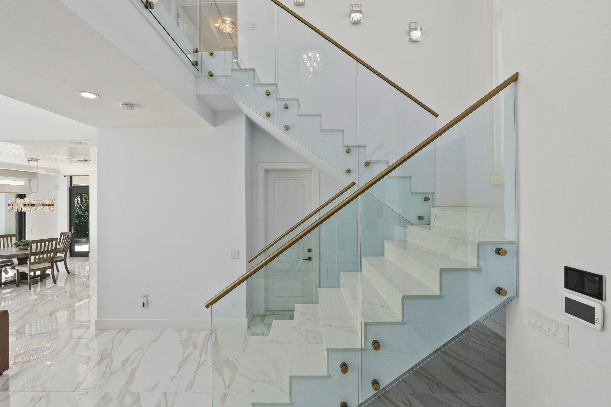 742 Marble Court Boca Raton, FL 33432 - Photo 25 of 95 a view of entryway and hall with wooden floor