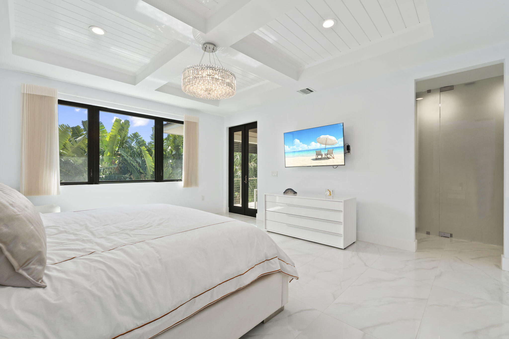 742 Marble Court Boca Raton, FL 33432 - Photo 31 of 95 a bedroom with a large bed and a window
