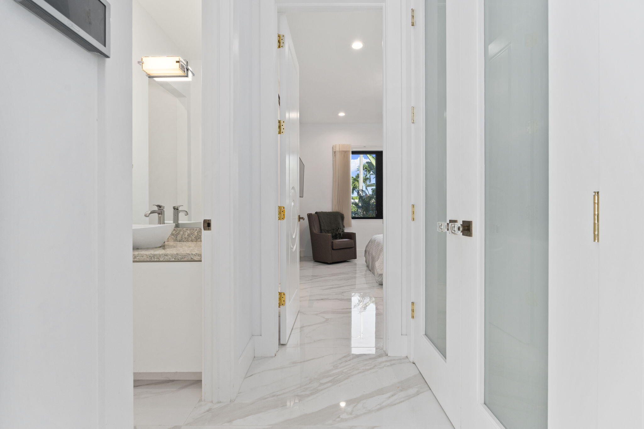 742 Marble Court Boca Raton, FL 33432 - Photo 36 of 95 a bathroom with a sink and mirror