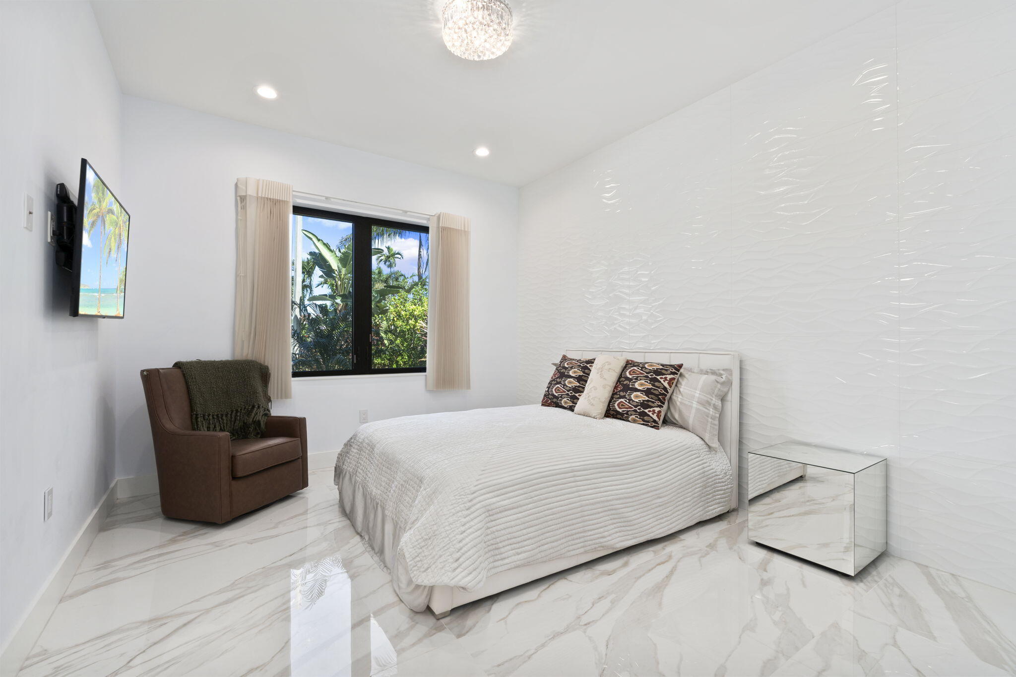 742 Marble Court Boca Raton, FL 33432 - Photo 55 of 95 a bedroom with a bed and a couch