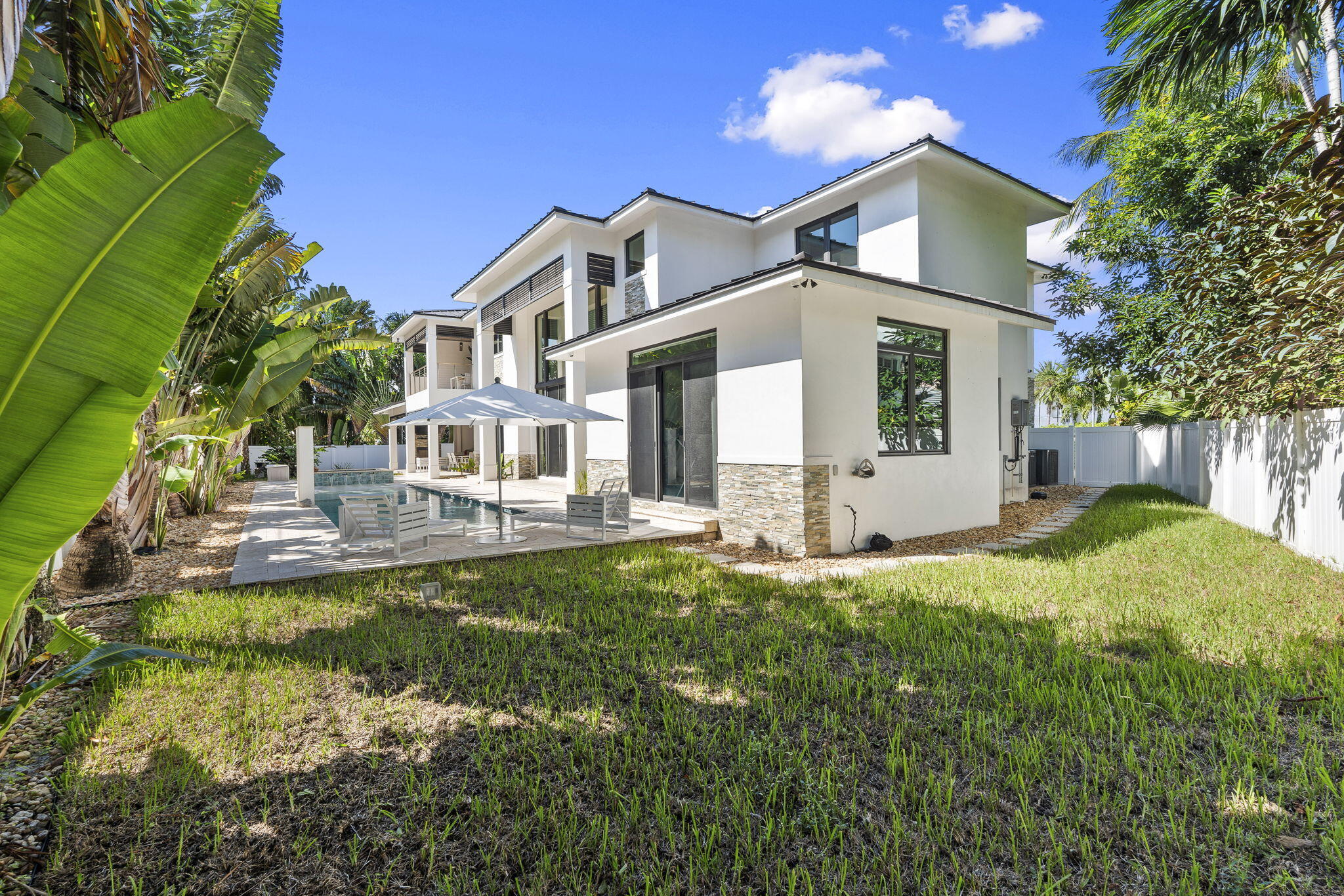 742 Marble Court Boca Raton, FL 33432 - Photo 67 of 95 a front view of a house with a yard