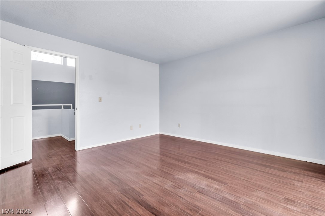 6250 West Flamingo Road, Unit 98 Las Vegas, NV 89103 - Photo 26 of 40 Unfurnished room featuring baseboards and wood finished floors