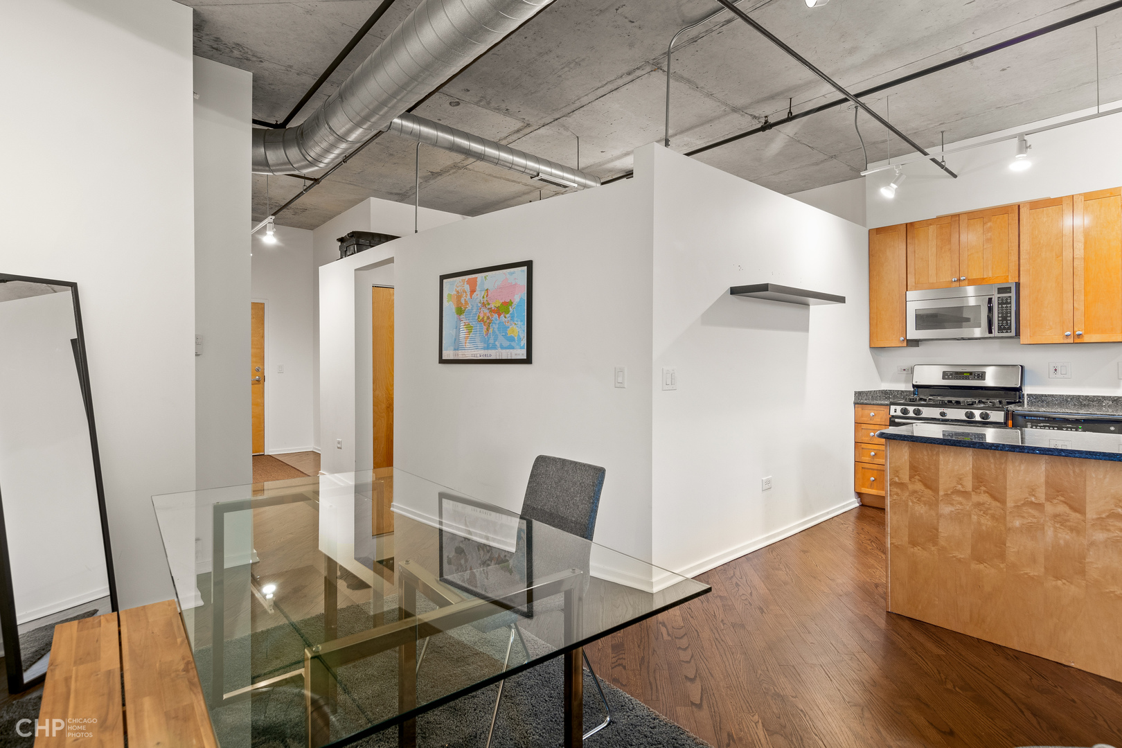 6 South Laflin Street, Unit 721 Chicago, IL 60607 - Photo 12 of 20 a view of a dining room with furniture