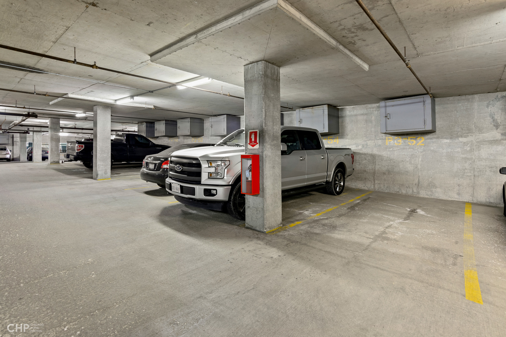 6 South Laflin Street, Unit 721 Chicago, IL 60607 - Photo 19 of 20 a car parked in garage