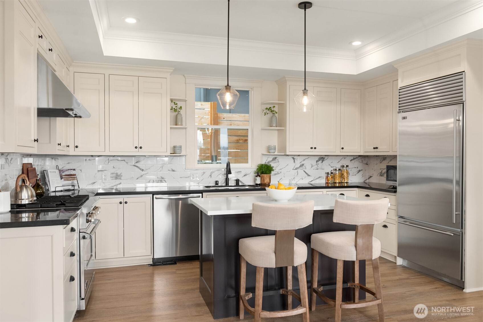 3807 East Jefferson Street Seattle, WA 98122 - Photo 13 of 39 a kitchen with white cabinets and white appliances