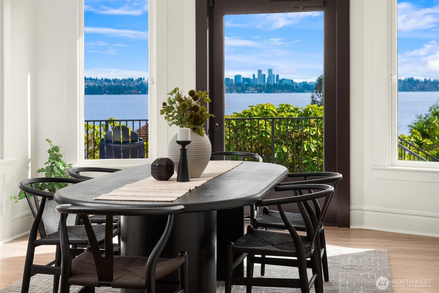 3807 East Jefferson Street Seattle, WA 98122 - Photo 18 of 39 a view of a balcony with table and chairs