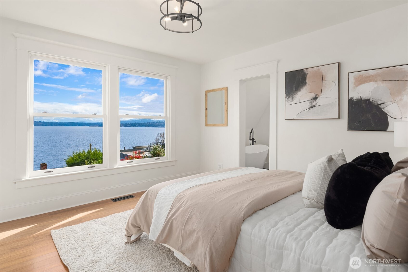 3807 East Jefferson Street Seattle, WA 98122 - Photo 25 of 39 a bedroom with a bed and a window