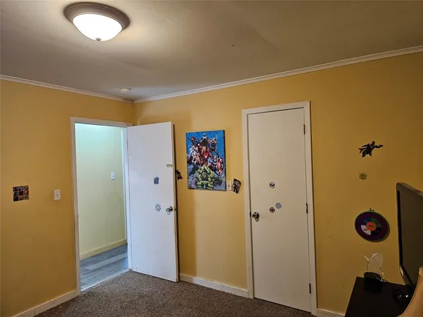 a view of a hallway with elevator