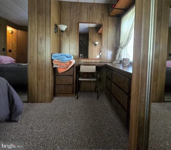 a room with a table and chairs