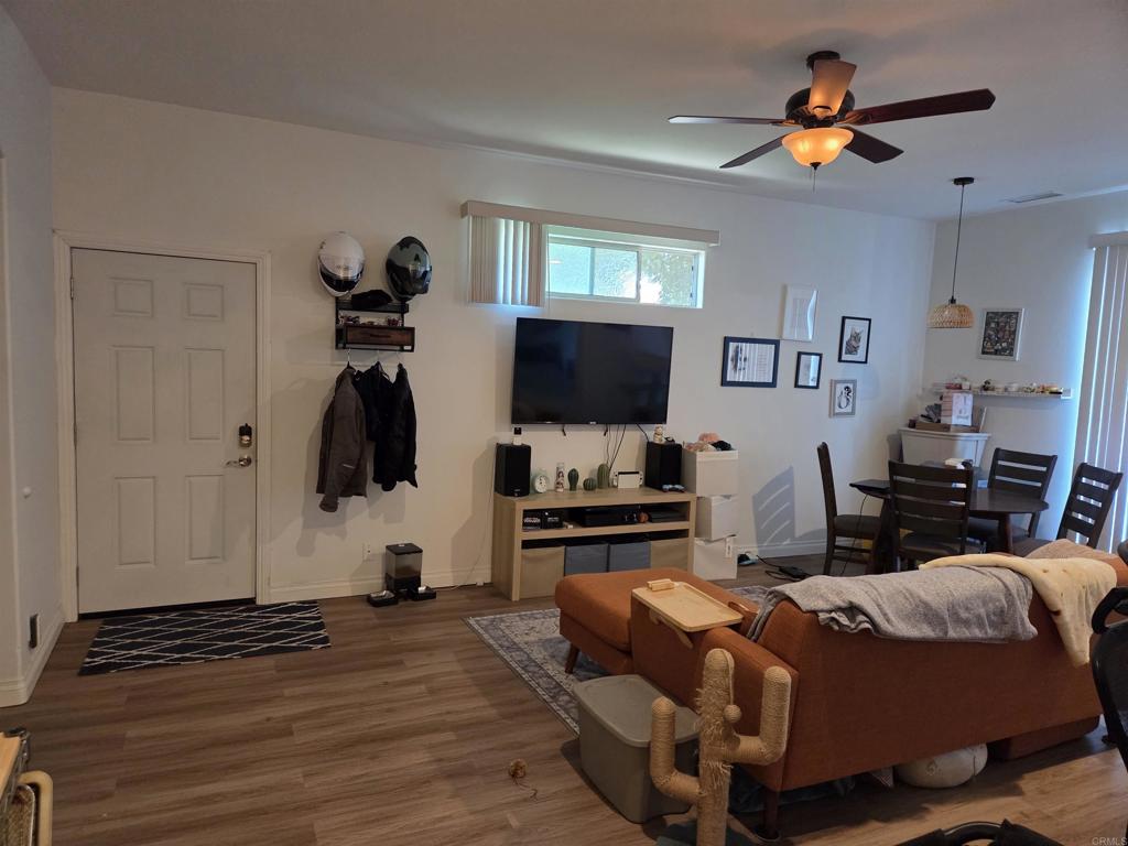 762 Grey Hawk Court Oceanside, CA 92057 - Photo 11 of 14 a bedroom with furniture and a flat screen tv