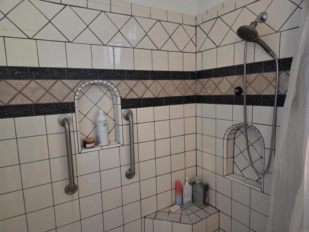 762 Grey Hawk Court Oceanside, CA 92057 - Photo 12 of 14 a bathroom with a shower