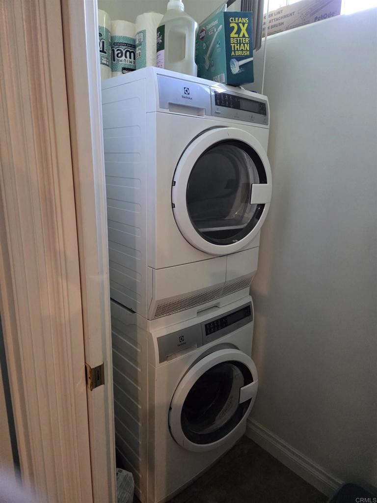 762 Grey Hawk Court Oceanside, CA 92057 - Photo 10 of 14 a utility room with dryer and washer
