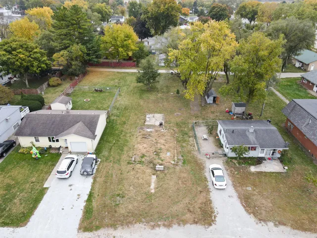 an aerial view of residential house with outdoor space