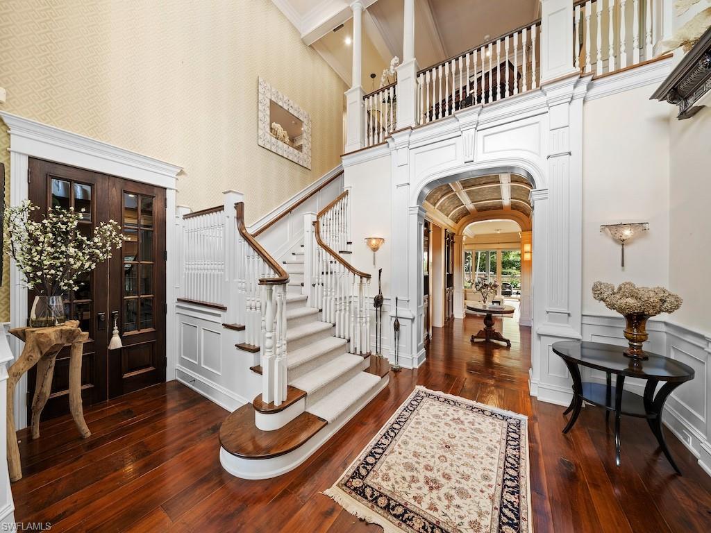 563 3rd Street North Naples, FL 34102 - Photo 10 of 15 a view of entryway and hall with wooden floor