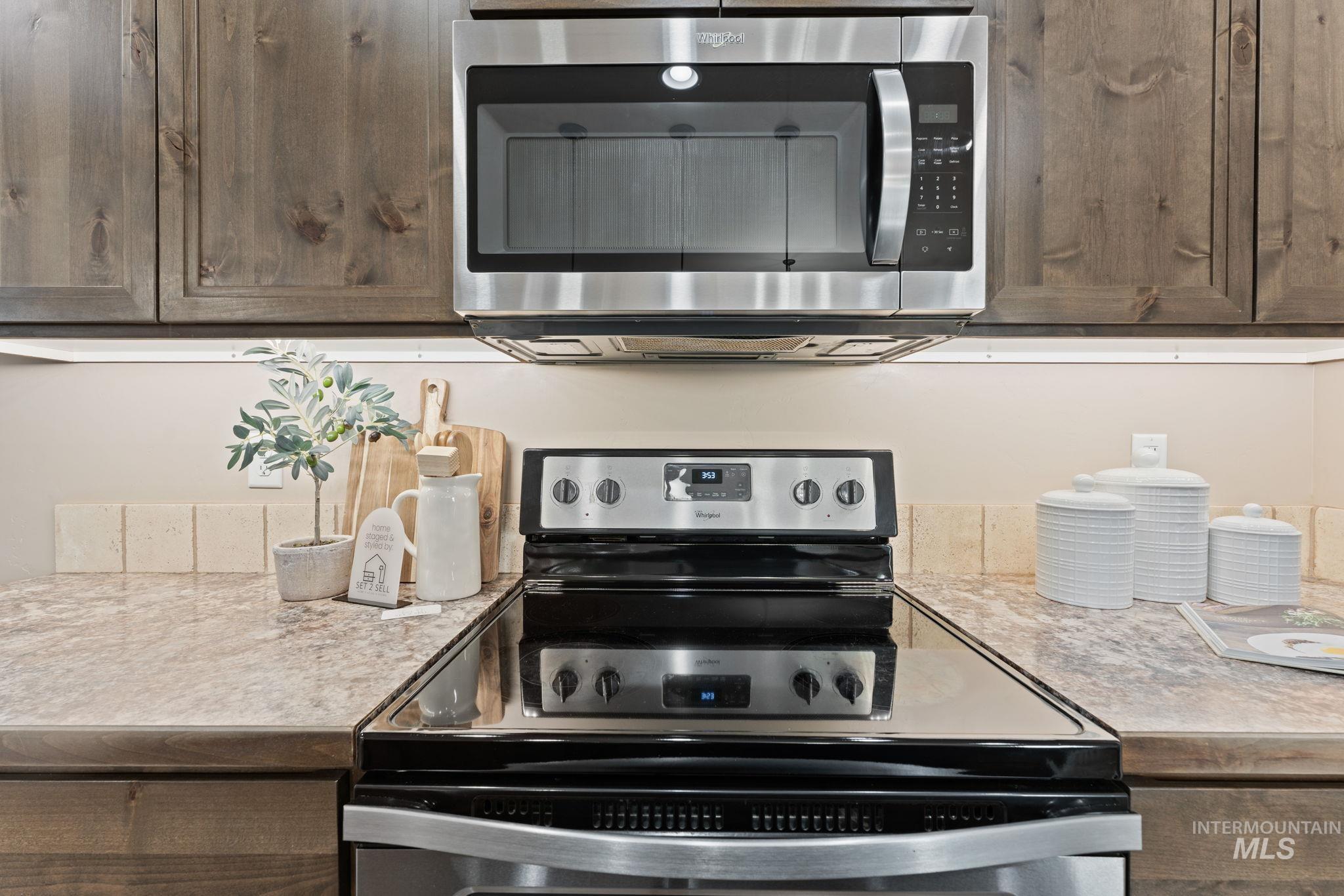 1001 13th Street Rupert, ID 83350 - Photo 11 of 40 Kitchen featuring stainless steel appliances and light countertops