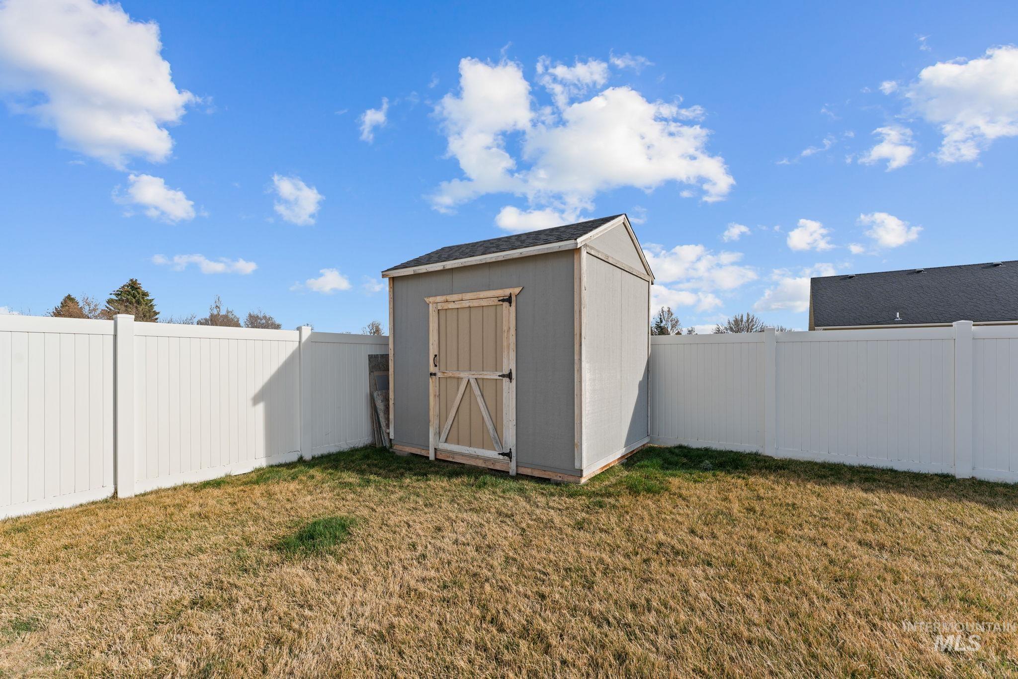 1001 13th Street Rupert, ID 83350 - Photo 33 of 40 View of shed featuring a fenced backyard