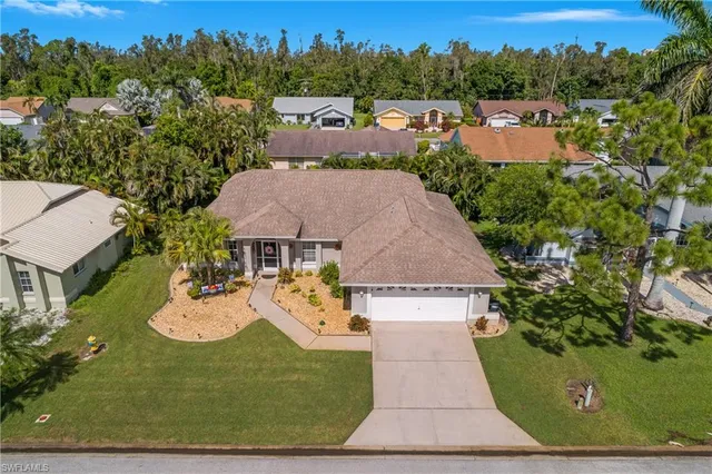 an aerial view of a house with garden