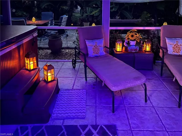 a view of a red chairs in front of retail building