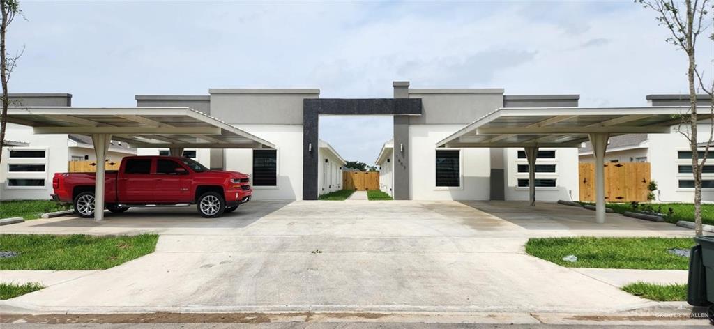 a view of a car is parked in front of a house