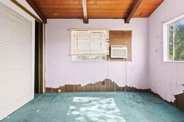 an empty room with windows