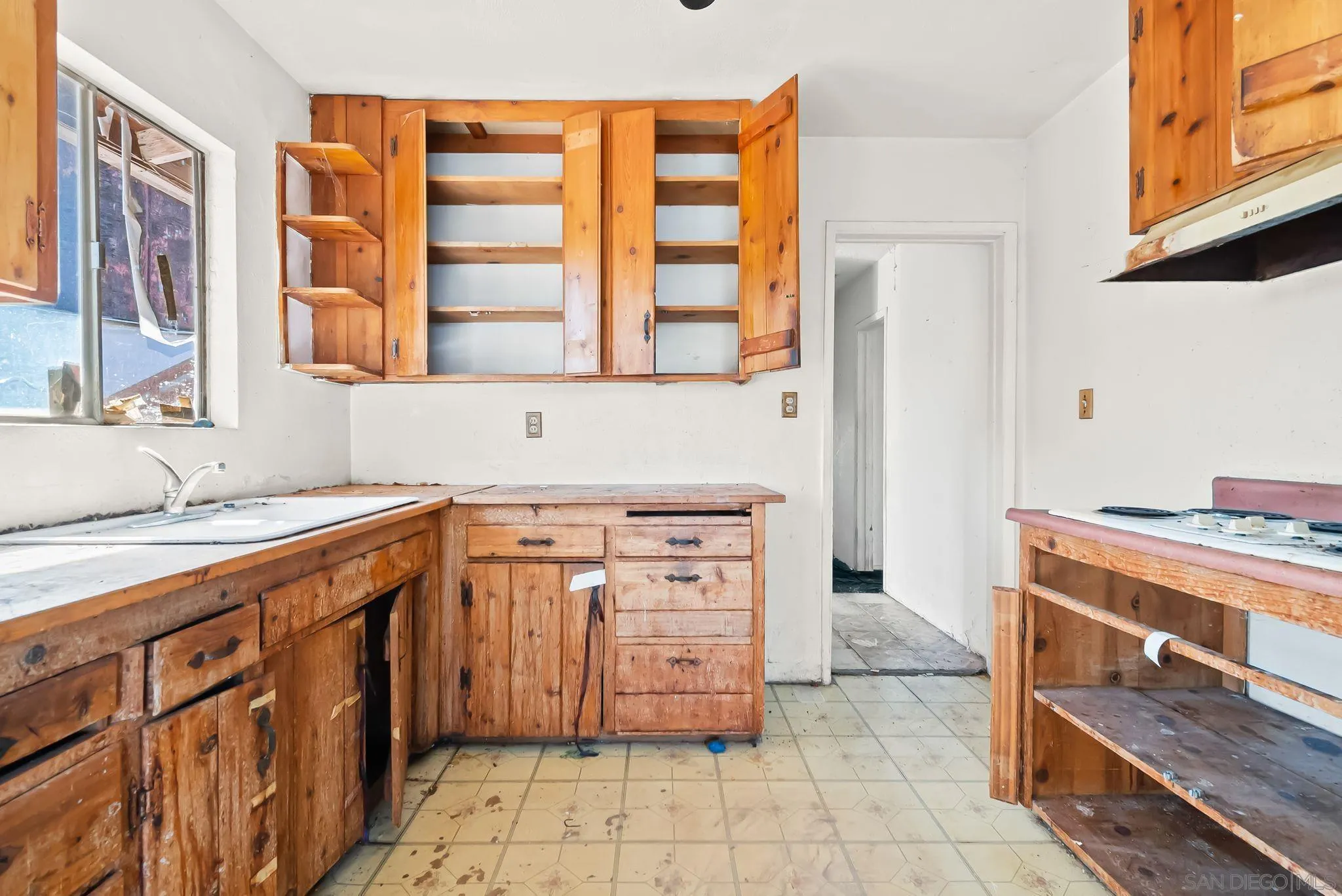 6133 Rainbow Heights Road Fallbrook, CA 92028 - Photo 25 of 55 a kitchen with stainless steel appliances a stove and a cabinets