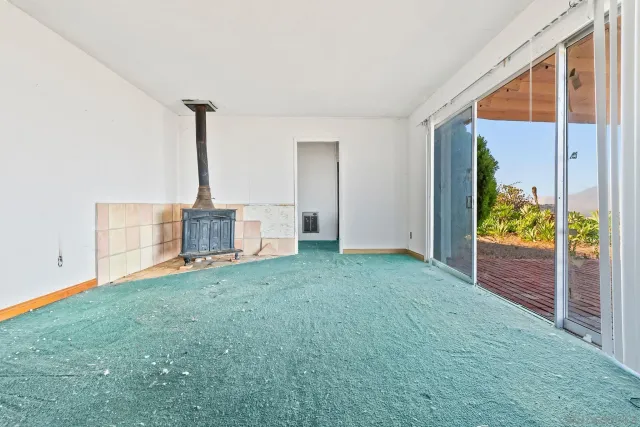 a view of a bedroom with bathroom