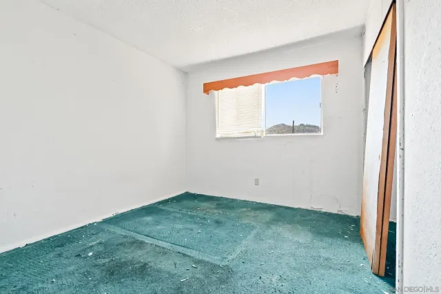 a view of a small space with a window