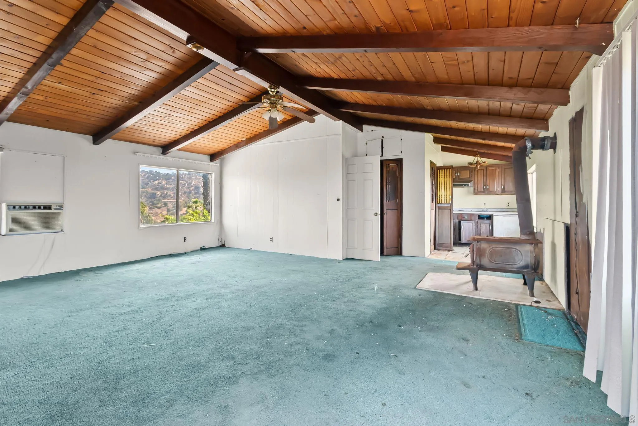 6133 Rainbow Heights Road Fallbrook, CA 92028 - Photo 4 of 55 a view of an empty room with a fireplace