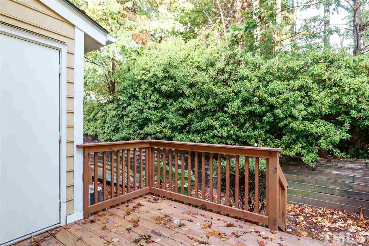 6705 Queen Annes Drive Raleigh, NC 27613 - Photo 3 of 3 a view of wooden balcony with a pot