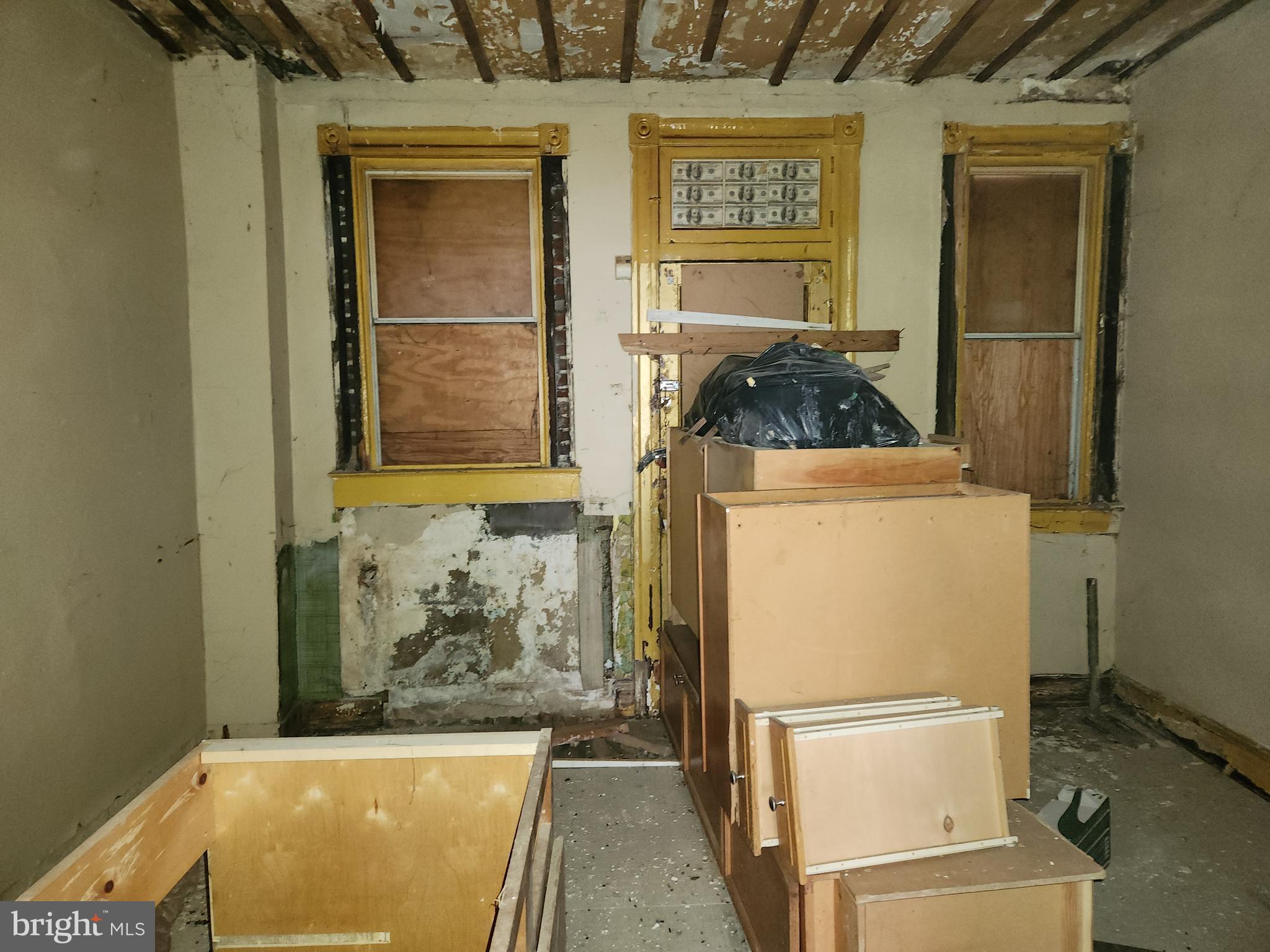 213 Furrow Street Baltimore, MD 21223 - Photo 7 of 19 a bathroom with a tub sink and mirror