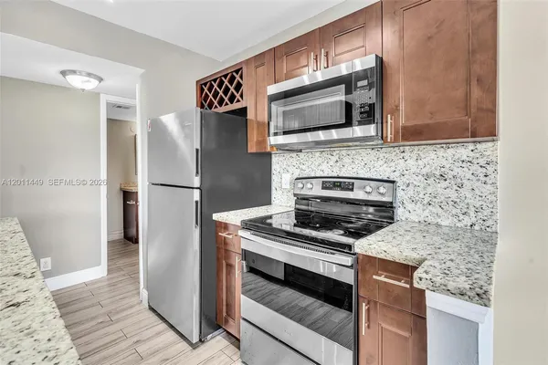 $1,895 | 5686 Rock Island Road, Unit 127, Tamarac, FL 33319