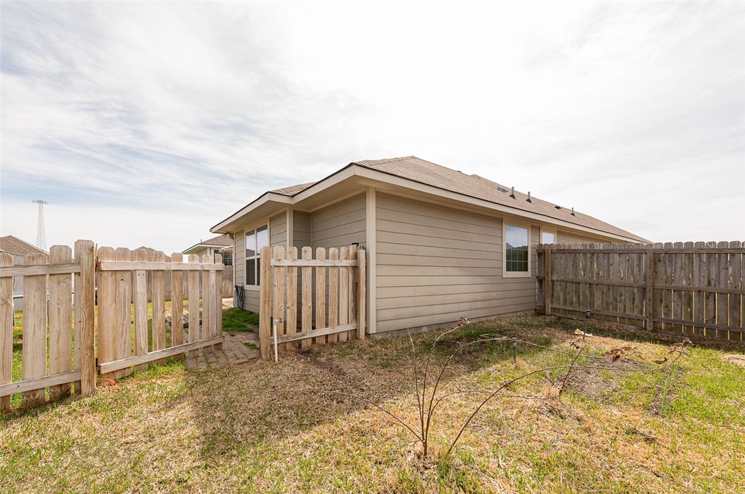 2702 Redcap Street Bryan, TX 77803 - Photo 15 of 17 a backyard of a house