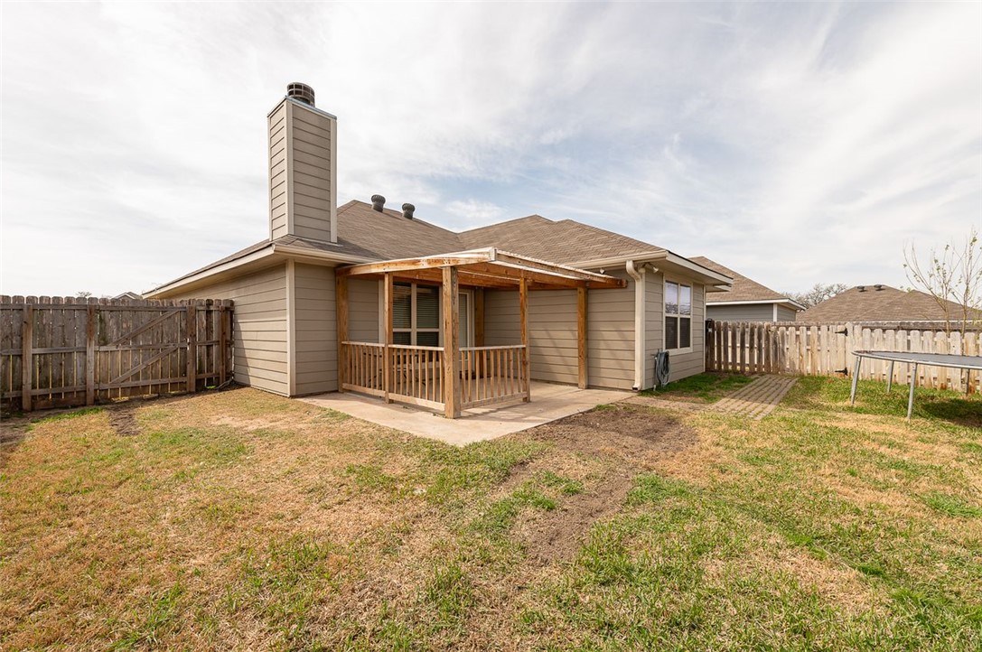 2702 Redcap Street Bryan, TX 77803 - Photo 17 of 17 a big house with a big yard and large trees