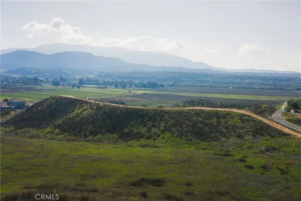 a view of an ocean and mountain