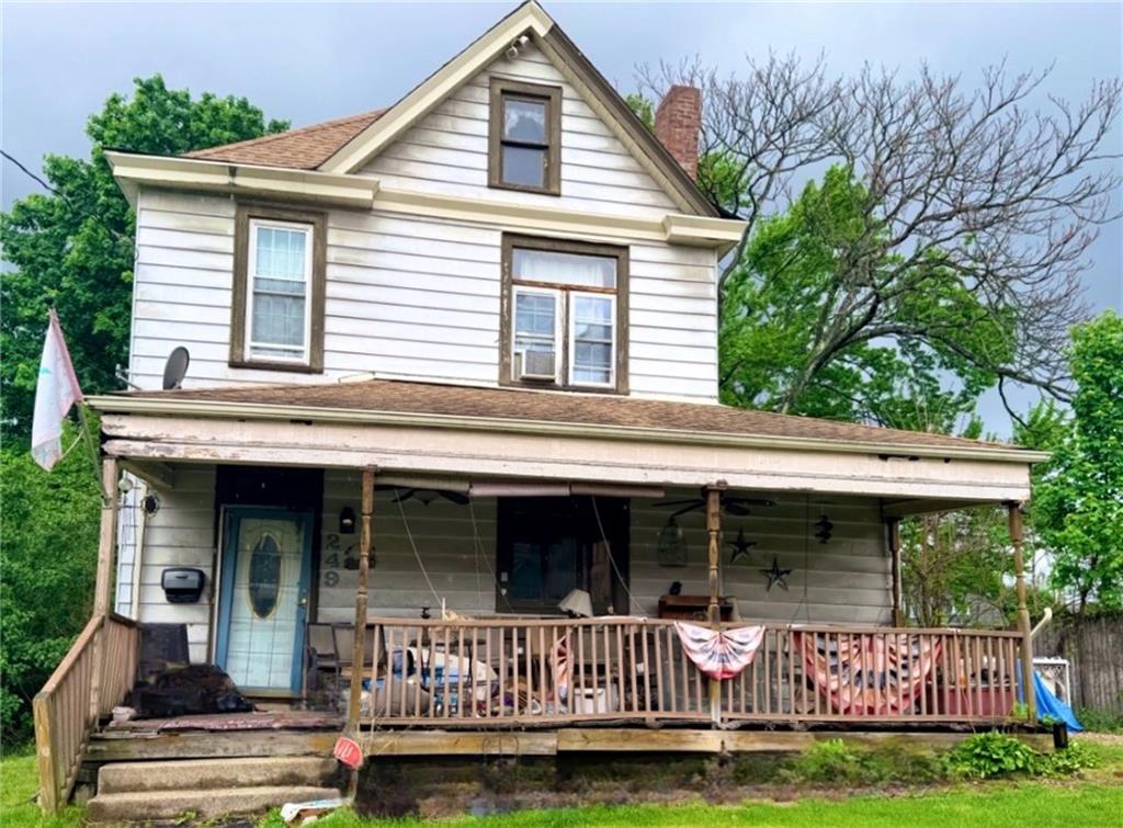 249 Freeport Road New Kensington, PA 15068 - Photo 1 of 11 front view of a house with a porch