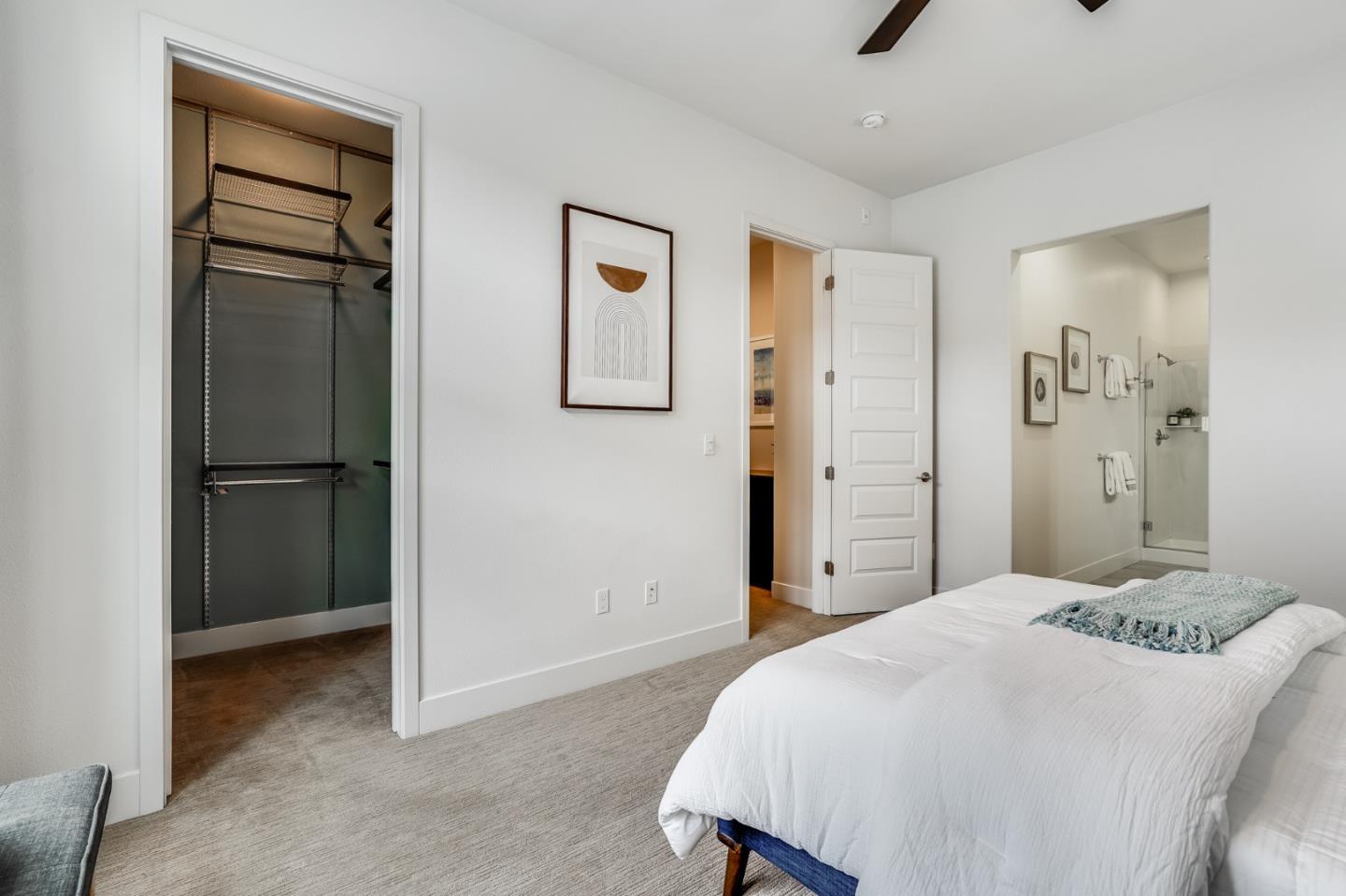 465 Landeros Drive San Mateo, CA 94403 - Photo 19 of 36 a bedroom with a bed and a cabinets