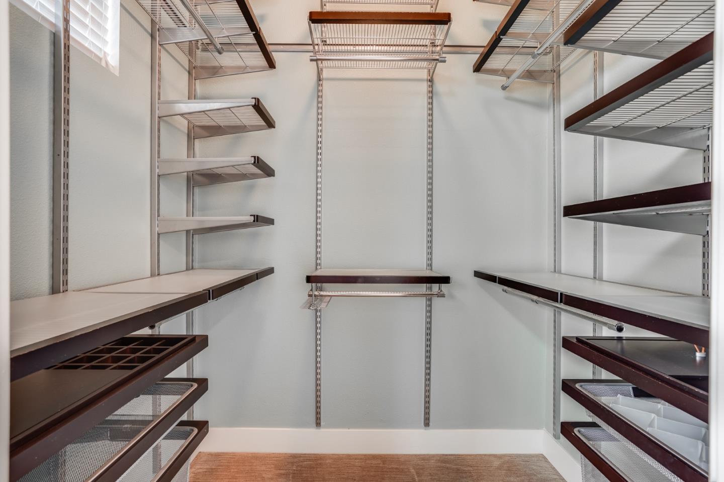 465 Landeros Drive San Mateo, CA 94403 - Photo 20 of 36 a view of walk in closet with empty racks