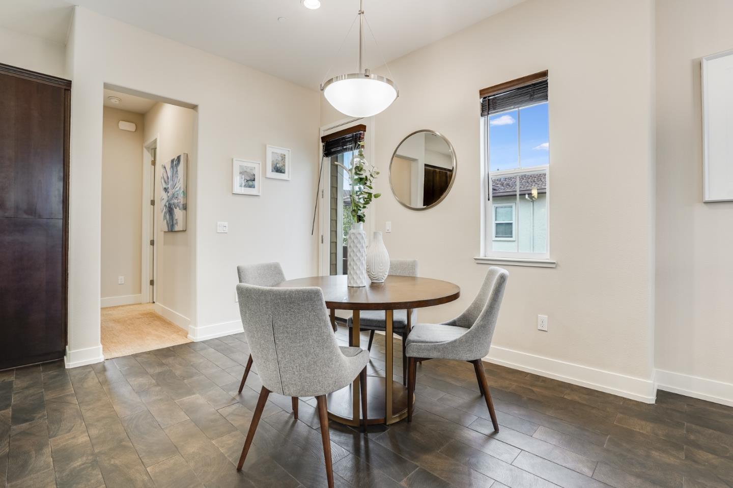 465 Landeros Drive San Mateo, CA 94403 - Photo 3 of 36 a view of a dining room with furniture and wooden floor
