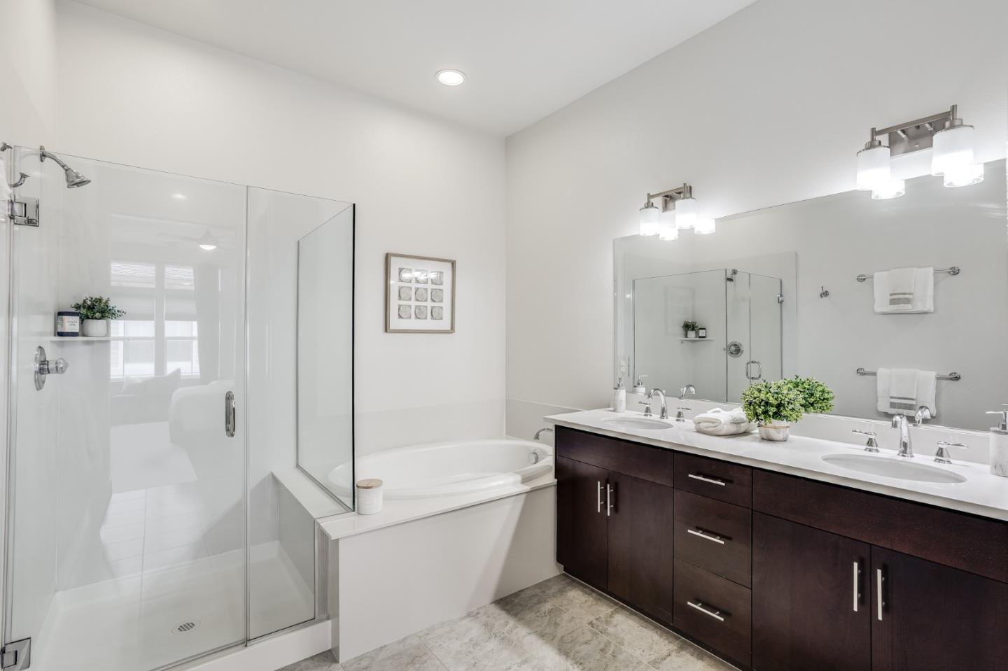 465 Landeros Drive San Mateo, CA 94403 - Photo 21 of 36 a bathroom with a tub sink shower and mirror