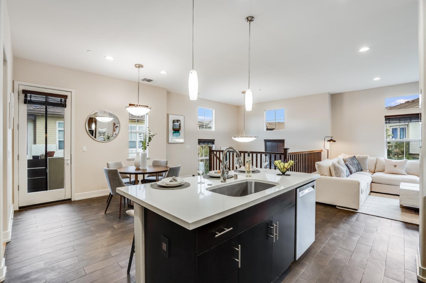 465 Landeros Drive San Mateo, CA 94403 - Photo 6 of 36 a large kitchen with a table and chairs