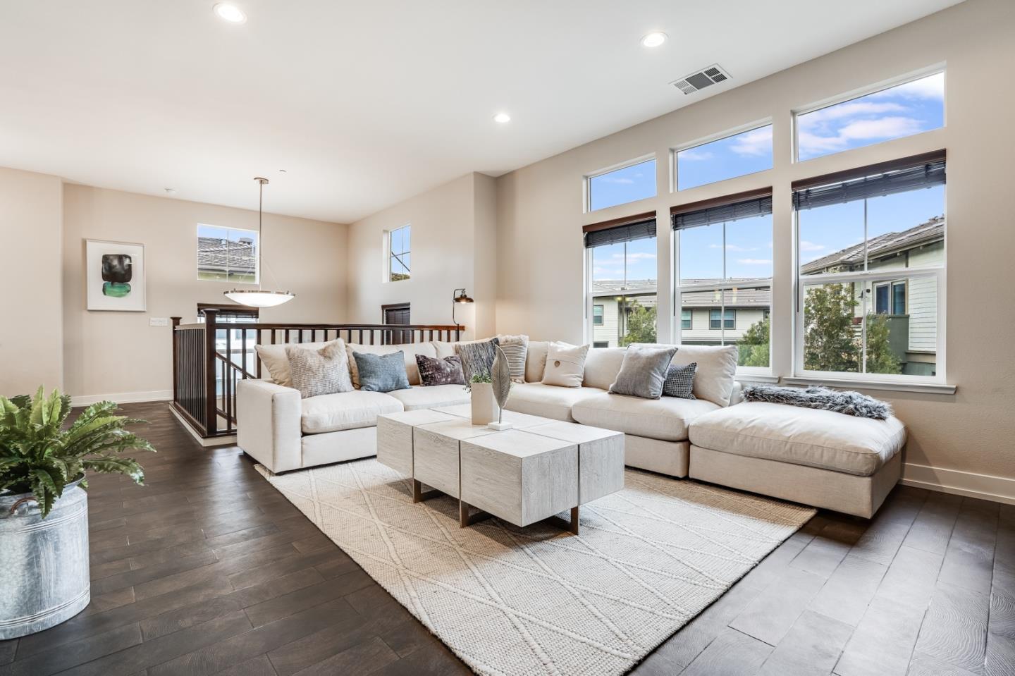 465 Landeros Drive San Mateo, CA 94403 - Photo 9 of 36 a living room with furniture potted plant and windows