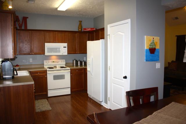 7218 Blue Ridge Drive Fairview, TN 37062 - Photo 8 of 20 Another view of kitchen from dining area. Oiled bronze doorknobs throughout the home.
