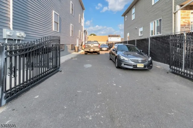 a car parked in front of a house