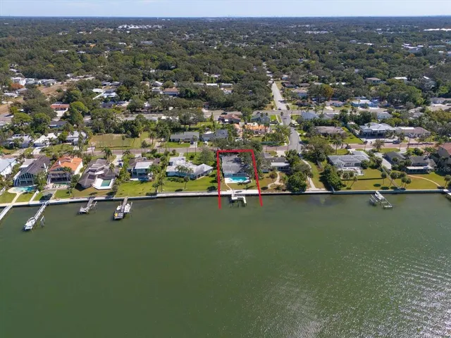 an aerial view of a house with a garden