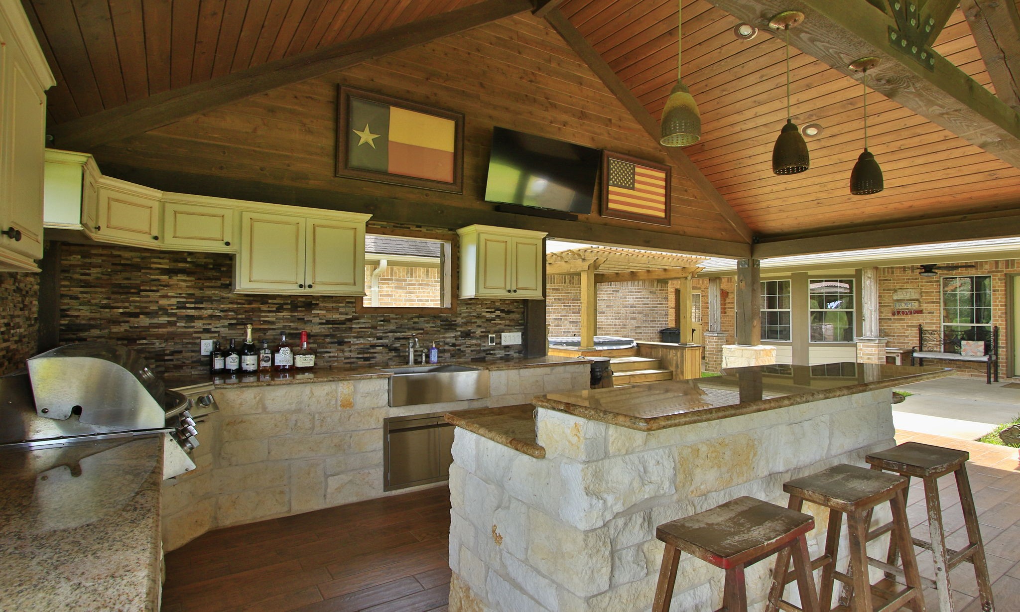 1824 Rymal Road Alvin, TX 77511 - Photo 28 of 39 a dining hall with stainless steel appliances granite countertop wooden floor a stove and a sink
