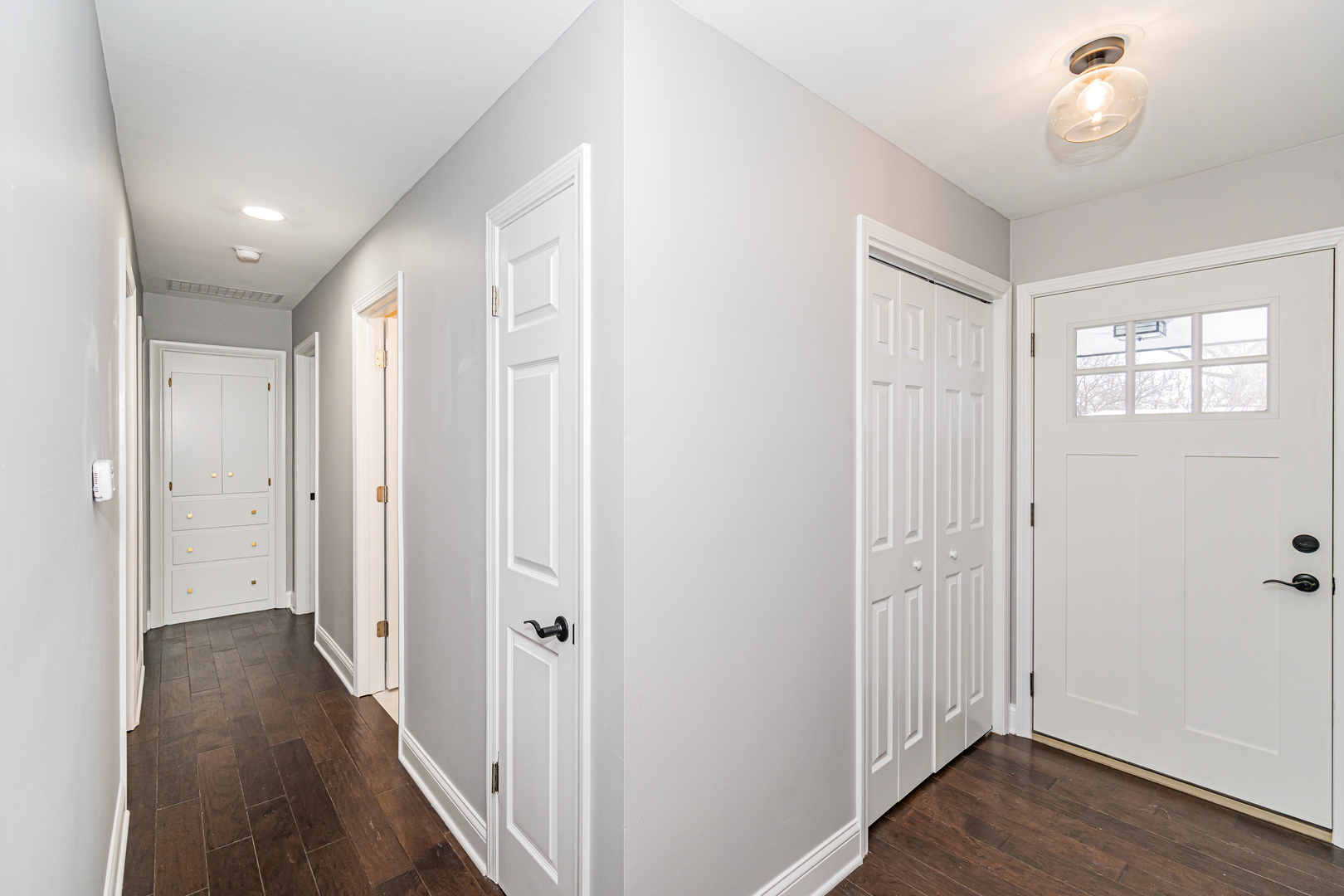 1913 Martingale Road Wheaton, IL 60187 - Photo 3 of 36 a view of a hallway with wooden floor